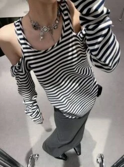 Black Stripes Shoulder Cut-Out Top | Hanni - NewJeans -Diva s Closet Black Stripes Shoulder Cut Out Top Hanni NewJeans 2 600x803 1