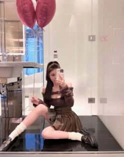 Olive Green Plaid Double Buckle Skirt | Wonyoung - IVE -Diva s Closet Brown Plaid Double Buckle Skirt Wonyoung IVE 4 600x760 1