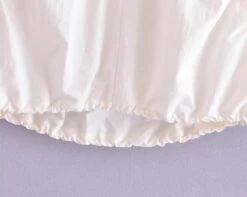 White Drawstring Sleeveless Top | Haerin - NewJeans -Diva s Closet Haerin NewJeans White Drawstring Sleeveless Top 10 600x479 1