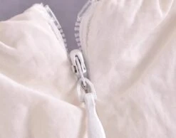 White Drawstring Sleeveless Top | Haerin - NewJeans -Diva s Closet Haerin NewJeans White Drawstring Sleeveless Top 11 600x471 1