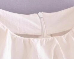 White Drawstring Sleeveless Top | Haerin - NewJeans -Diva s Closet Haerin NewJeans White Drawstring Sleeveless Top 7 600x480 1