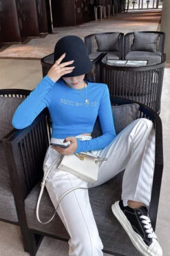 White Go To The Dogs Long Sleeve Crop Top | Hyuna -Diva s Closet Hyuna Go To The Dogs Long Sleeve Crop Top 7 600x900 1