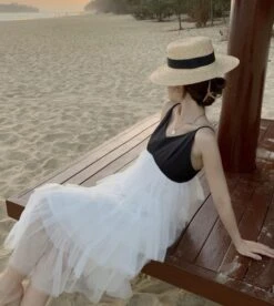 White And Black Layered Ruffle Mesh Sling Dress | Jennie - BlackPink -Diva s Closet Jennie BlackPink Layered Ruffle Mesh Sling Dress 4 600x671 1