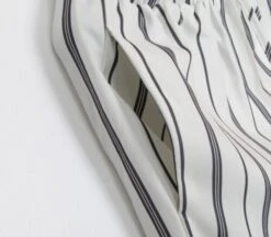 White Vertical Striped Wide Leg Pants | Jennie - BlackPink -Diva s Closet Jennie Vertical Striped Wide Leg Pants 3 600x525 1