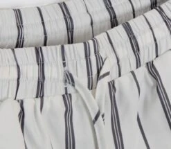 White Vertical Striped Wide Leg Pants | Jennie - BlackPink -Diva s Closet Jennie Vertical Striped Wide Leg Pants 4 600x523 1