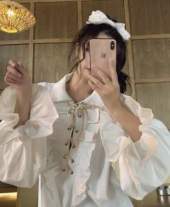 White Ruffled Blouse | Jeongin - Stray Kids -Diva s Closet Jeongin Stray Kids White Ruffled Shirt 12 e1643802359783 600x731 1