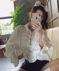 White Ruffled Blouse | Jeongin - Stray Kids -Diva s Closet Jeongin Stray Kids White Ruffled Shirt 20 600x726 1