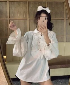 White Ruffled Blouse | Jeongin - Stray Kids -Diva s Closet Jeongin Stray Kids White Ruffled Shirt 23 600x726 1