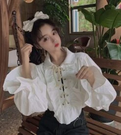 White Ruffled Blouse | Jeongin - Stray Kids -Diva s Closet Jeongin Stray Kids White Ruffled Shirt 25 600x667 1