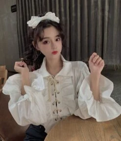 White Ruffled Blouse | Jeongin - Stray Kids -Diva s Closet Jeongin Stray Kids White Ruffled Shirt 4 600x699 1