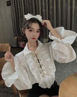 White Ruffled Blouse | Jeongin - Stray Kids -Diva s Closet Jeongin Stray Kids White Ruffled Shirt 9 e1643802394201 600x758 1