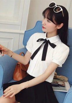 White Puffed Sleeves Blouse With Bow Tie | Jeongyeon - Twice -Diva s Closet Jeongyeon White Short Sleeve Shirt with Lace Bow Tie 2 e1643623524304