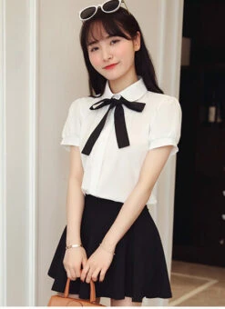 White Puffed Sleeves Blouse With Bow Tie | Jeongyeon - Twice -Diva s Closet Jeongyeon White Short Sleeve Shirt with Lace Bow Tie 3 e1643623488958