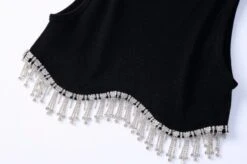 Black Tassel Crop Top | SuA - Dreamcatcher 22 Black Tassel Crop Top | SuA - Dreamcatcher -Diva s Closet Sua Dreamcatcher Black Tassel Crop Top 10 600x399 1