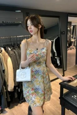 Green Oil Painting Design Floral Sling Dress | Sullyoon - NMIXX -Diva s Closet Sullyoon NMIXX Green Floral Sling Dress 2 600x899 1