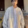 White Striped Oversized Collared Shirt | Jaehyuk - Treasure -Diva s Closet White Striped Oversized Shirt Jaehyuk Treasure 6 600x751 1