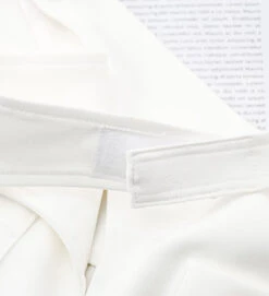 White Criss-Cross Waist Flared Pants | Wonyoung - IVE -Diva s Closet Wonyoung White Criss Cross Waist Flared Pants 3 600x658 1